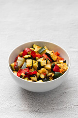 Grilled vegetables on plate with spices and herbs