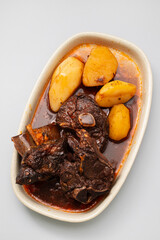 Chanfana a traditional Portuguese dish made of slow-cooked goat stewed in red wine
