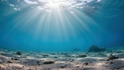 Underwater sunlight beams shining through the ocean creating a serene and peaceful atmosphere perfect for backgrounds and nature photography
