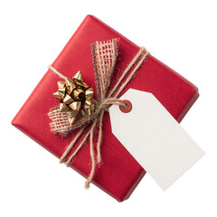 Christmas gift box present with blank tag, ribbon and pine branch on transparent background
