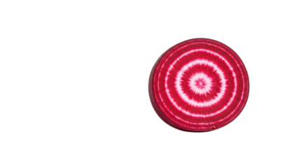 A single, circular slice of fresh beetroot reveals its beautiful, natural red and white concentric ring pattern, isolated on transparent background