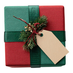 Christmas gift box present with blank tag, ribbon and pine branch on transparent background