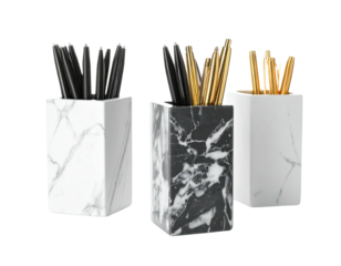 Three decorative containers, filled with writing instruments, made of marble-look materials