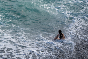 young woman in the sea