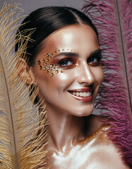 Let's dance to forget all our problems. Cropped photo of beautiful samba dancers performing at a carnival with their band.