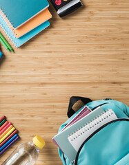 Copy space. School supplies set for back to school: notebook, pencils, watercolors, rulers, colored pencils. School supplies seen from above. Back to school