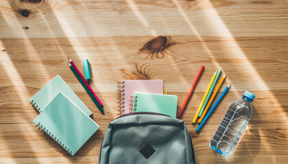 Copy space. School supplies set for back to school: notebook, pencils, watercolors, rulers, colored pencils. School supplies seen from above. Back to school