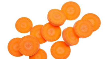 Sliced Orange Carrots Scattered On A Red Yellow Striped Background vegetable food