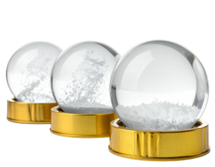 Three glass globes on golden bases, filled with white flakes, set against a black background