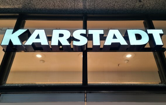 KARSTADT department store illuminating its name above building entrance