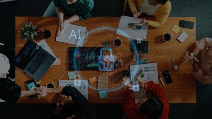 Aerial view of diverse professionals engaged in a strategic discussion, incorporating artificial intelligence, data analysis, and digital security in a collaborative workspace. Raster