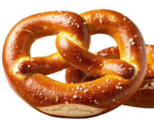 Close-up of a freshly baked, golden-brown bread with salt crystals, showcasing a twisted shape