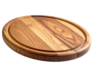 Oval-shaped wooden cutting board, with groove around edge, on a transparent backdrop