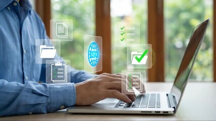 Digital Document Management System: Person using laptop with virtual icons for secure cloud storage, data organization, and efficient workflow auto... - Powered by Adobe