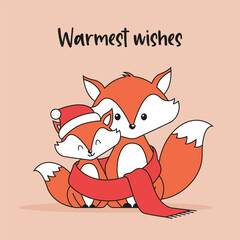 Christmas card with two foxes and warmest wishes text