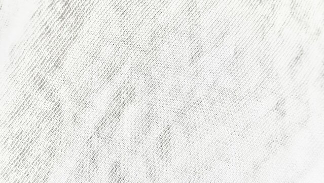 close-up abstract photo of white surface with diagonal gray hatching lines texture and subtle shading variations