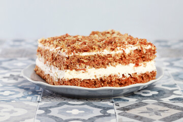 A layer carrot cake with coconut cream.
