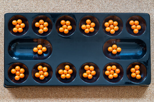 Top-down view of Kalah board game