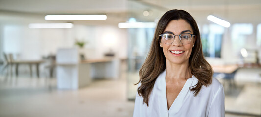 Happy middle aged business woman, smiling 45 years old lady entrepreneur, mature female...