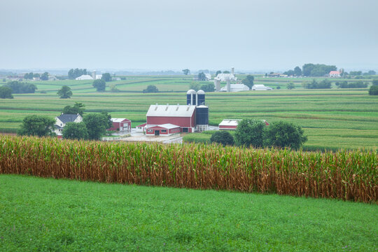 Landscape of farms in Lancaster County Pennsylvania during summer on a cloudy day