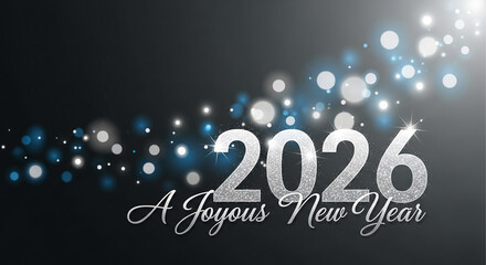 Image of sparkly silver "2026" numbers and the words "A Joyous New Year" on a dark background with light effects, representing a celebration of the new year