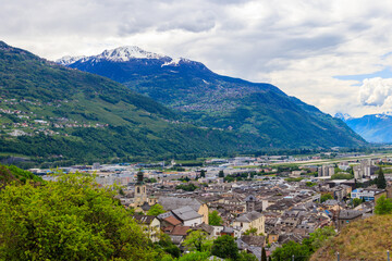 Obraz premium Panoramic view from a hill over City of Sion with and Swiss Alps in Canton Valais, Switzerland