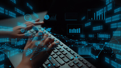 A close-up of hands typing on a keyboard with an overlay of digital graphs and data visualizations, representing technology, analysis, and business insights in a modern workspace. Xenic