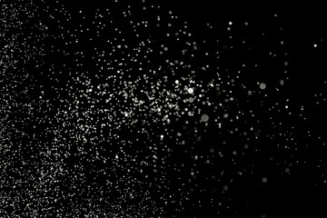 Blurry garland lights on a dark background. Festive Christmas and New Year background. Soft focus. Image toned in color of the year 2026 - Cloud Dancer.