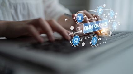 A focused image showing hands typing on a laptop with overlays of icons representing omni channel marketing, highlighting the connection between digital strategies and business growth. Tessel