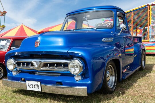 A restored Ford F100 pickup truck from 1968