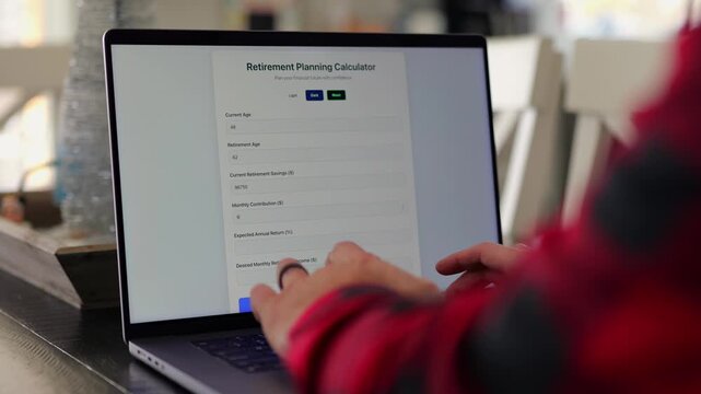 Middle Aged Man Using Retirement Calculator App at Kitchen Table Finding Savings Underestimated Funds Required to Financially Survive Concept