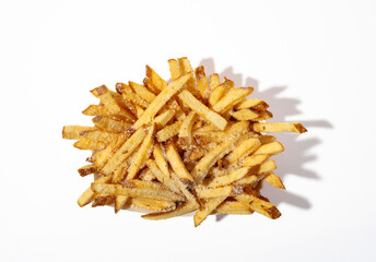 A pile of french fries sprinkled with garlic and Parmesan cheese on white background. Overhead angle.