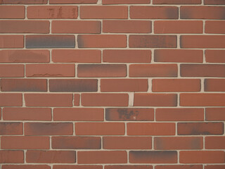 Obraz premium Classic red brick wall offers rustic charm and enduring strength for architectural designs, adding warmth and character to any building project