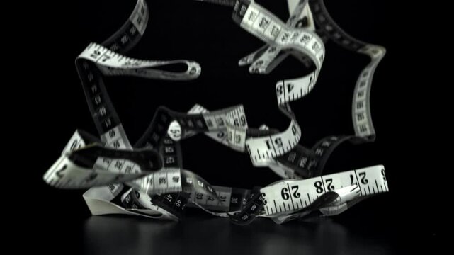 The measuring ruler for sewing falls on the table. Filmed on a high-speed camera at 1000 fps. High quality FullHD footage