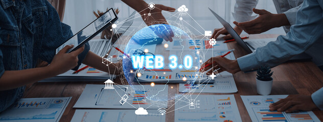 A dynamic business team collaborates on a Web 3.0 strategy, surrounded by charts and digital tools, emphasizing innovative teamwork in a modern office. Trope