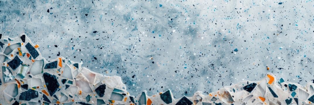 Textured terrazzo surface with white, gray, black, and blue stones. A modern, stylish background ideal for portfolios of construction firms, interior designers, and renovation service providers