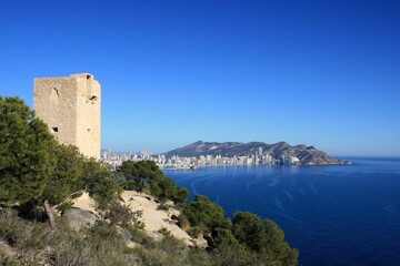 Fototapeta premium Aerial view from de Mediterranean Sea of the antique center of Benidorm city and the Levante Beach with the skyline.