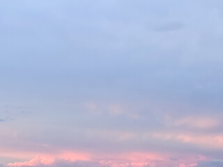 Vibrant Sunset Clouds over Pastel Sky