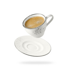 Light grey vintage cup hot coffee and saucer flying isolated on white background. Porcelain retro cup in trendy color of  2026 Cloud Dancer.