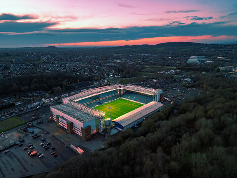 An aerial view at sunset of Ewood Park, home to Blackburn Rovers Football Club in Lancashire, UK