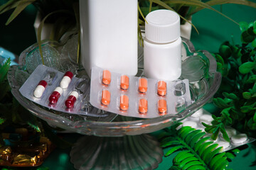 Pill holder with greenery