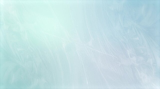 Rotating ice themed winter motion background with patterns of swirling icy frost particles naturally forming cold chilly frost pretty floral organic shapes in cold chilly cool colours 4K animated 