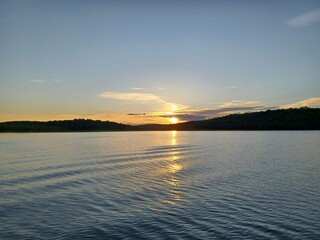 A beautiful golden sunset reflecting off of Canada Lake in the Adirondack Wilderness.