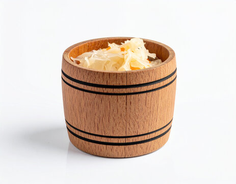 A small, wooden barrel is resting on its side, showing a slight residue of fermented Kapusta (sauerkraut) brine.