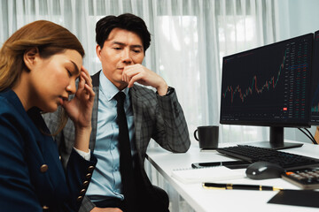 Stressful exchange investing business partners discussing in loss profit stock exchange rate...