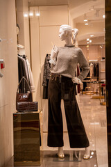 Mannequin in Trendy Winter Apparel Display in Boutique