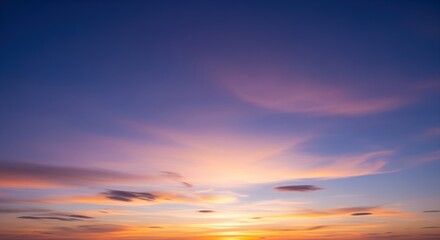 Stunning sky at sunset with soft clouds in shades of pink, orange, and blue. Perfect for backgrounds, wellness content, or peaceful themes. The calm colors create a serene mood.