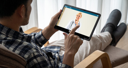 Doctor video call online by modish telemedicine software application for virtual meeting with patient