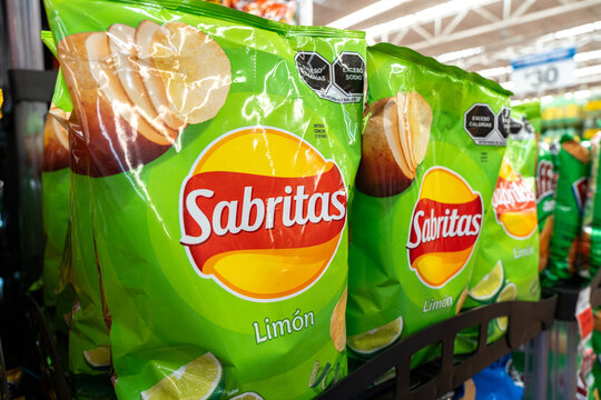 Sabritas Lemon flavored chips bags on a Walmart shelf. PepsiCo brand, originated in Mexico (founded in 1943). Jalisco, Mexico, December 4, 2025. frito Lays