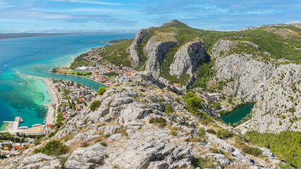 The seaside town of Omis in Croatia is situated at the foot of the mountains, with views of the bay, the town and the mountains from the tourist attraction Fort Mirabela.
